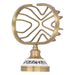 Soap Dish Holder Basket in antique brass-tone metal, with a circular open wire frame and blue floral porcelain base