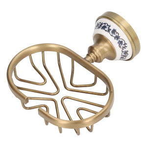 Soap Dish Holder Basket in antique gold-toned metal with a white ceramic wall mount, blue floral pattern, and open drain base