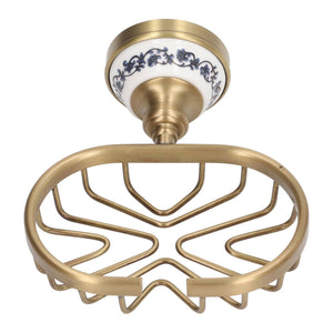 Soap Dish Holder Basket in antique gold-tone metal, with an open geometric wire base and blue floral wall mount