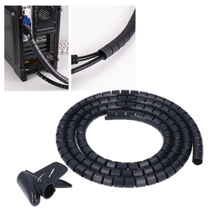 Spiral Cable Wrap in black flexible plastic, shown coiled with an adhesive clip and bundling computer cables