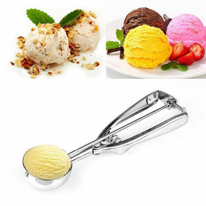 Stainless Steel Ice Cream Spoon with a polished silver metal finish, spring handle and rounded scoop holding ice cream