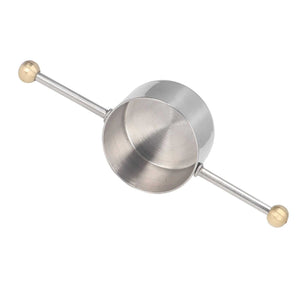 Stainless Steel Measuring Cup jigger with a polished silver metal bowl and slim double handle tipped with gold-toned balls
