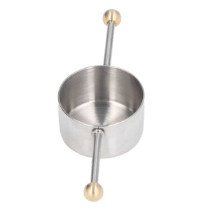 Stainless Steel Measuring Cup with a polished silver finish, brushed interior, and slender double-ball handle with gold-toned ends