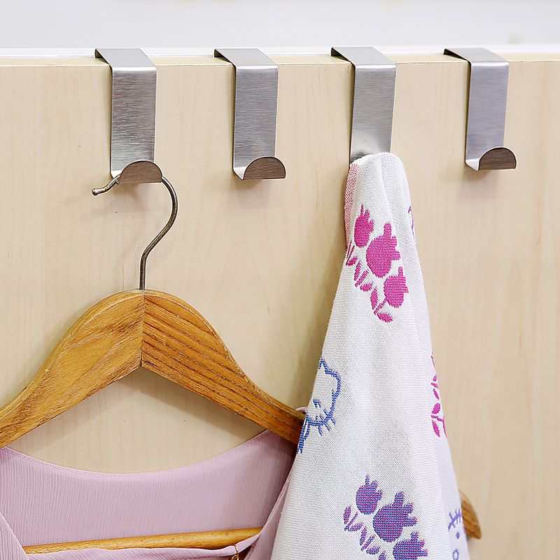 Stainless Steel Over Door Hook set with silver Z-shaped metal hooks supporting a wooden hanger and a floral towel