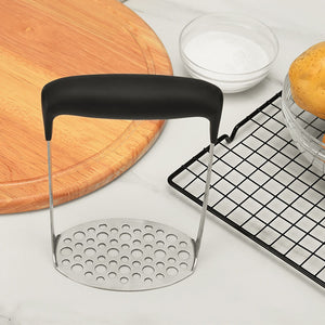 Stainless Steel Potato Masher with a perforated metal plate and wide black horizontal grip handle