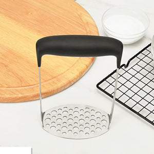 Stainless Steel Potato Masher with a perforated silver steel plate and wide black horizontal grip handle