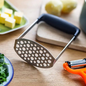 Stainless Steel Potato Masher with a perforated steel mashing plate and wide black horizontal grip