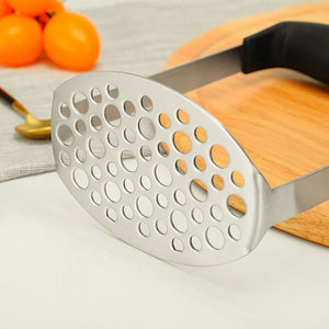 Stainless Steel Potato Masher with a silver perforated oval mashing plate and wide black horizontal grip