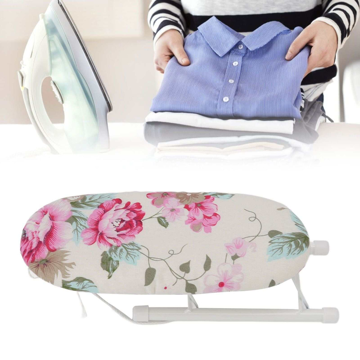 Tabletop Ironing Board with a cream fabric cover, pink peony and green leaf pattern, and white folding metal frame