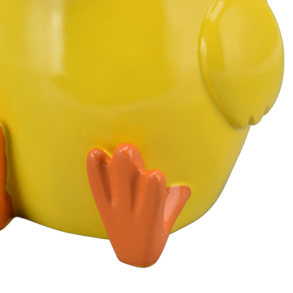 Toilet Brush Little Yellow Duck in glossy yellow resin with an orange webbed foot and sculpted duck details