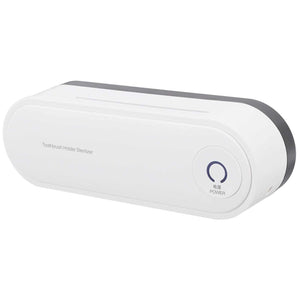 Toothbrush Holder Drying unit in white plastic with a slim rounded rectangular case and circular power button