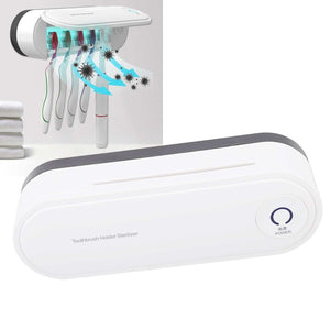 Toothbrush Holder Drying unit in white plastic with a rounded wall-mounted case, power button, and toothbrush slots