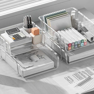 Transparent Desktop Stationery Organizer in clear plastic with divided compartments storing pens, markers, notebooks and a calculator