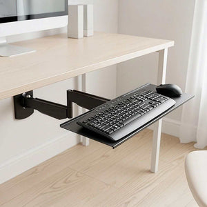 Wall Mount Keyboard Tray with adjustable folding arm in black aluminium, ergonomic tilt, holding keyboard and mouse attached to wall below desk