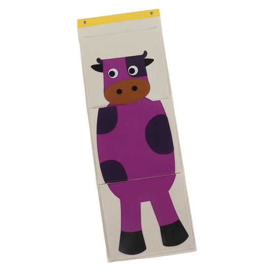 Wall Mounted Storage Bag in cream felt with a bright pink and purple cartoon cow, three pockets and yellow hanging strip