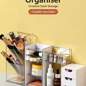 White Frame Drawer Organizer in clear plastic with an angled makeup brush grid, three drawers, and white storage compartments.