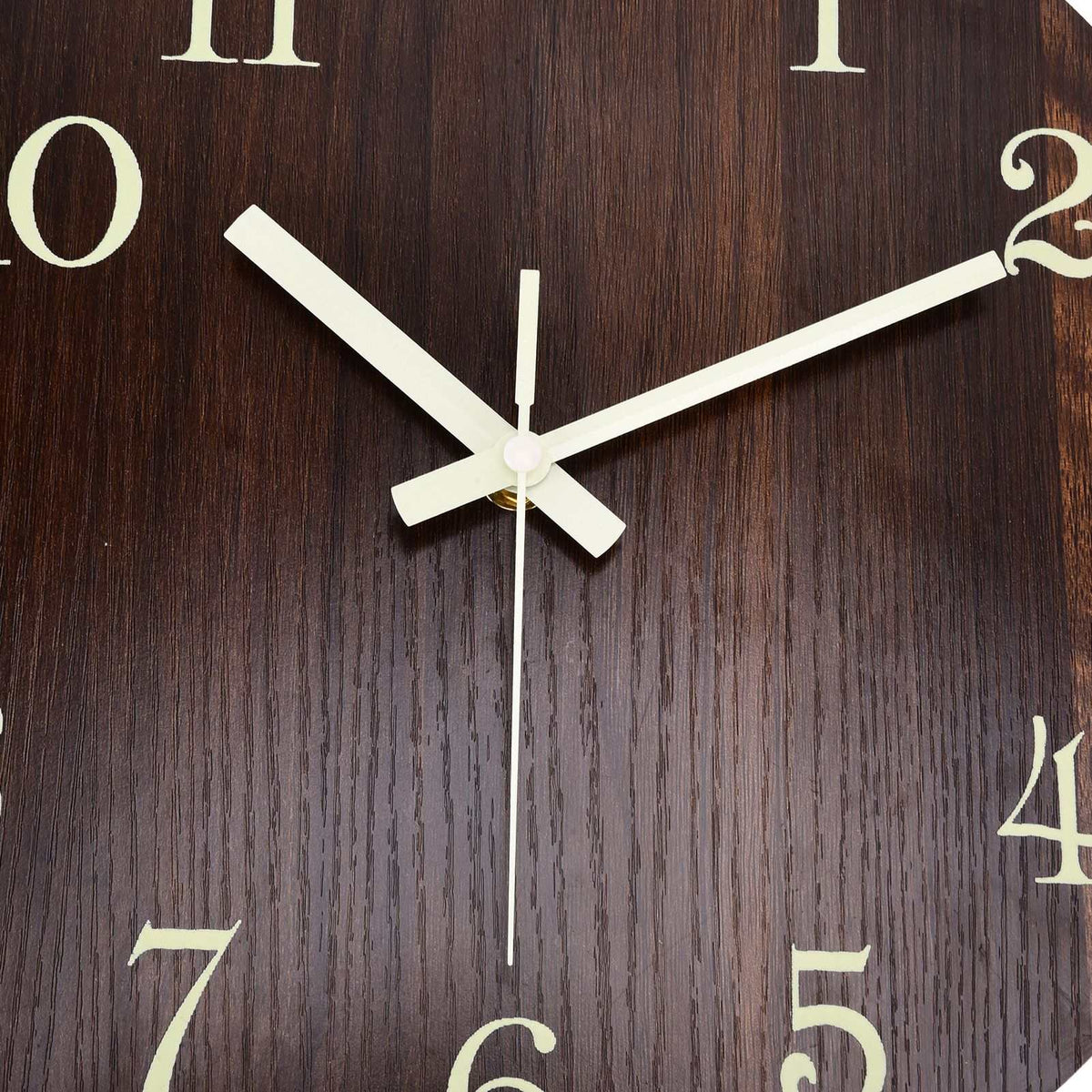 Wood Wall Clock with a dark brown wood-grain face, cream-colored numerals and pale hands in a frameless design