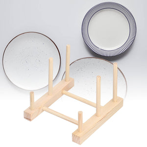 Wooden Dish Plate rack in pale natural pine with upright dowels, holding two speckled ceramic plates